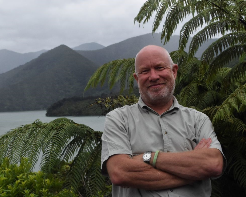 Don Pointon stands in front of the Marlborough Sounds. 